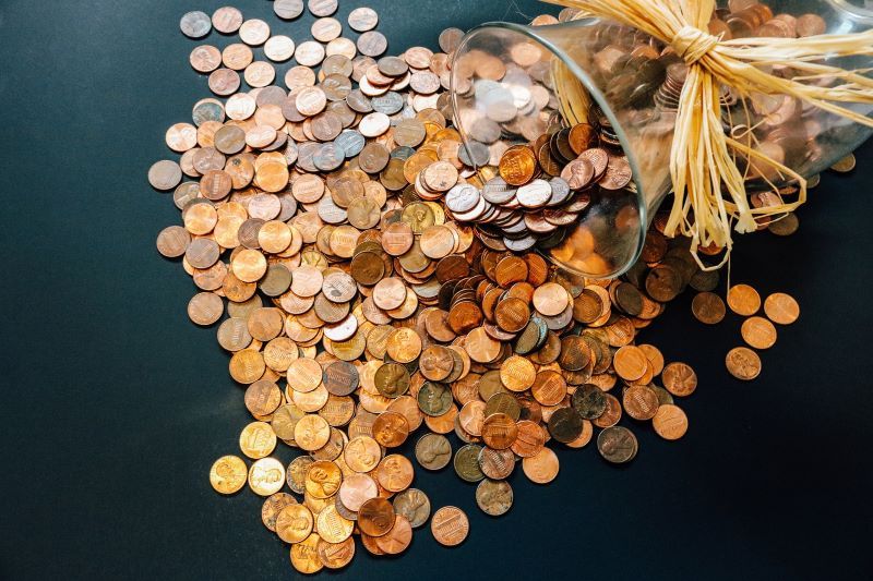 Pennies poured out of vase